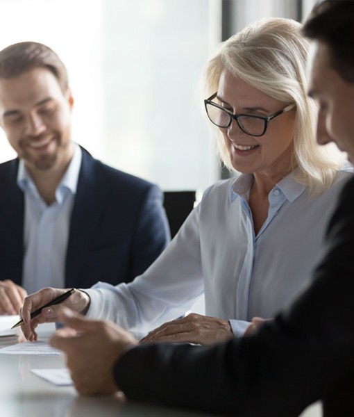 Business people discussing a document